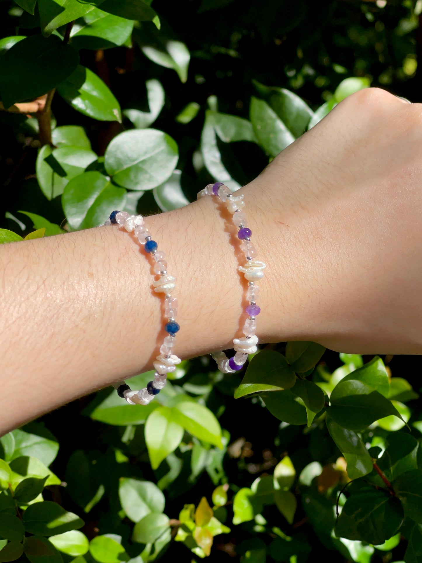 Blue stone, silver, and pearl Bracelet (left)