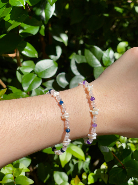 Blue stone, silver, and pearl Bracelet (left)